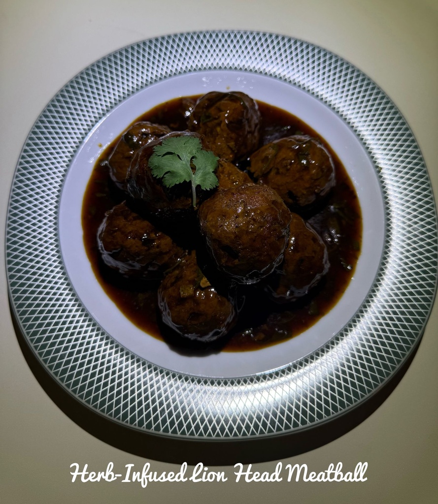 Herb-infused Lion Head Meatball.jpeg